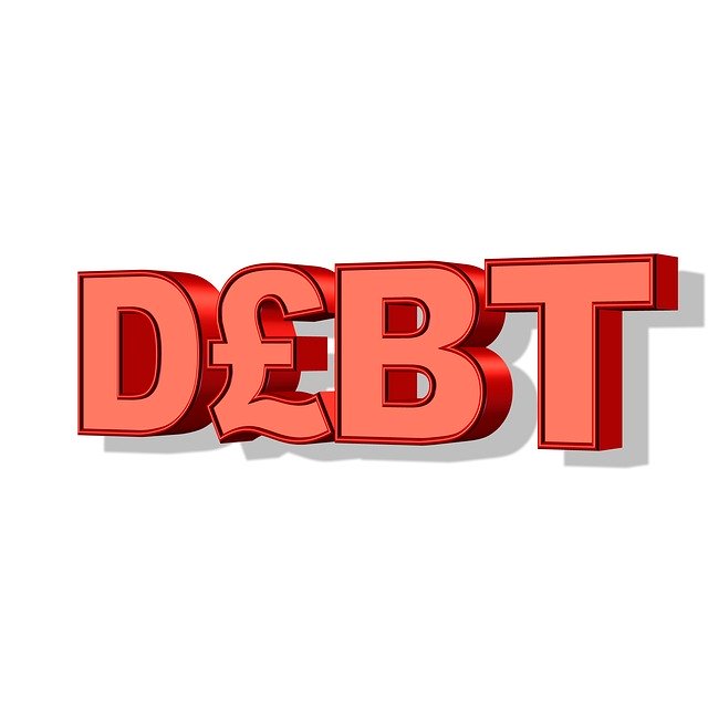 červený nápis debt